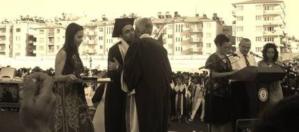 Congratulations at the podium during the diploma ceremony.